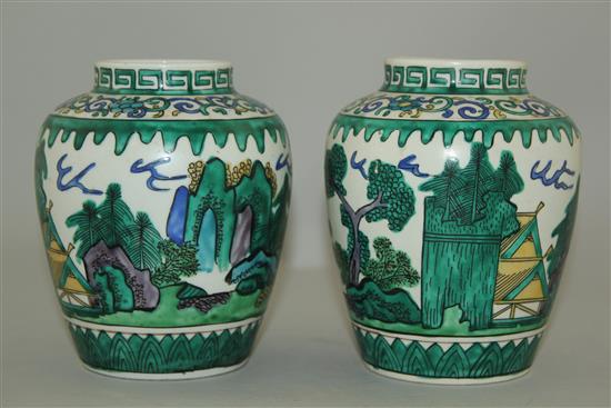 A pair of Japanese green Kutani ovoid jars, late 19th century, 13cm